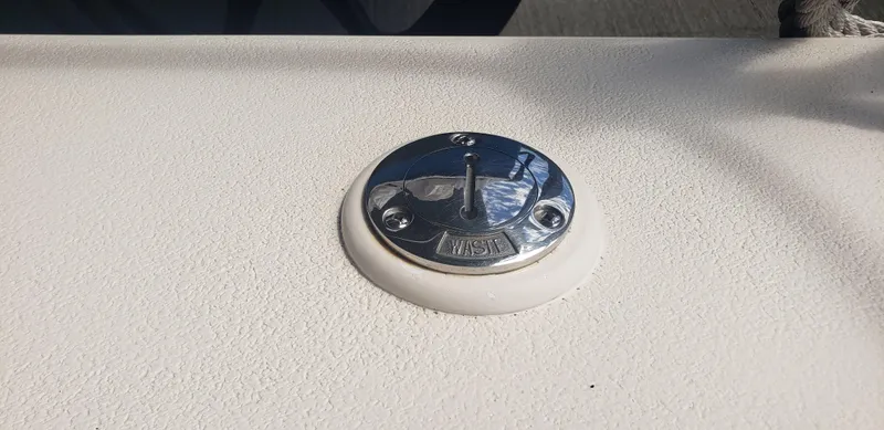 Slide: The Image of Chrome deck fitting on 1977 Chris-Craft 28' Cruiser boat. - 12