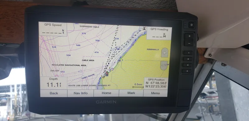 Slide: The Image of Garmin GPS display on 1977 Chris-Craft 28' Cruiser showing navigation map and coordinates. - 16