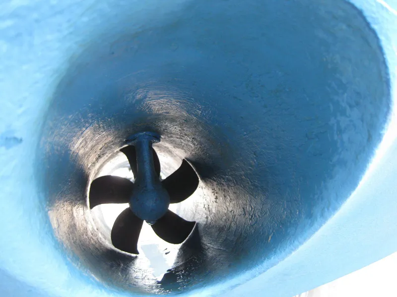 Slide: The Image of Propeller of 1977 Chris-Craft 28' Cruiser, viewed from below, in blue hull. - 17