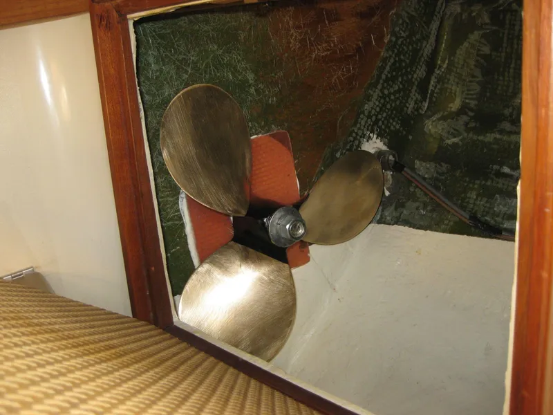 Slide: The Image of Propeller of 1977 Chris-Craft 28' Cruiser inside cabin, showing three blades. - 29