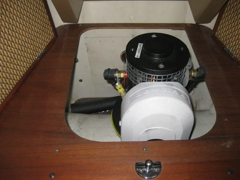 Slide: The Image of 1977 Chris-Craft 28' Cruiser engine compartment with visible motor components. - 31