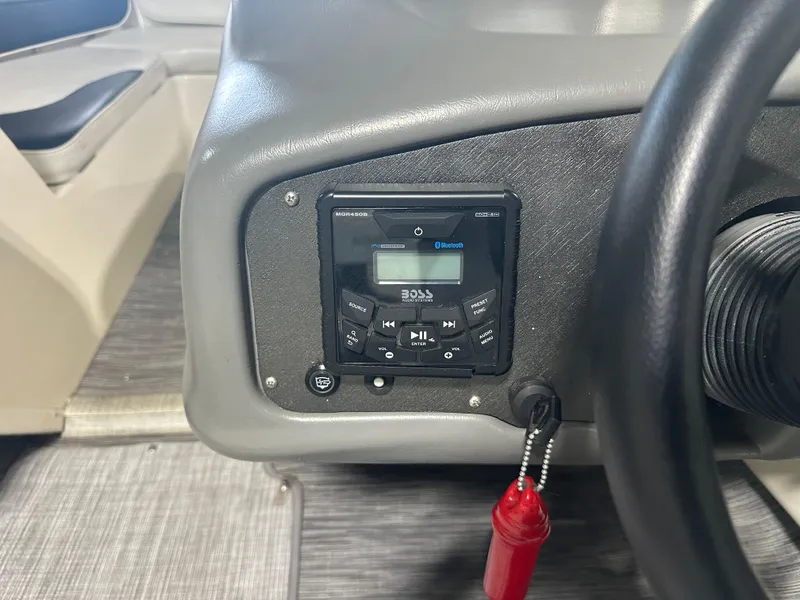 Slide: The Image of Dashboard of 1999 Rinker 212 Bowrider Captiva with Boss audio system. - 22