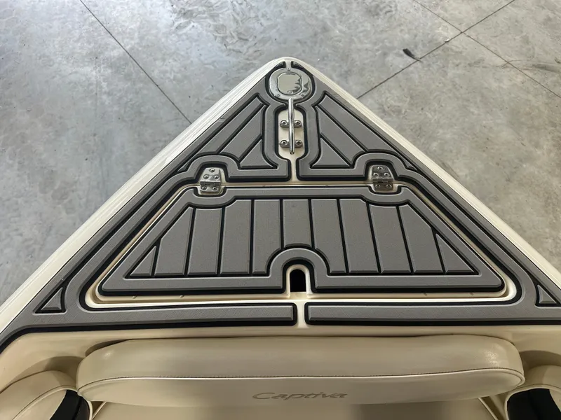 Slide: The Image of 1999 Rinker 212 Bowrider Captiva boat deck with custom non-slip padding. - 27