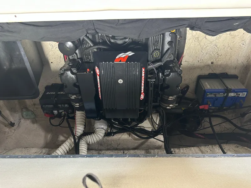 Slide: The Image of Engine compartment of a 1999 Rinker 212 Bowrider Captiva with Mercury components. - 28