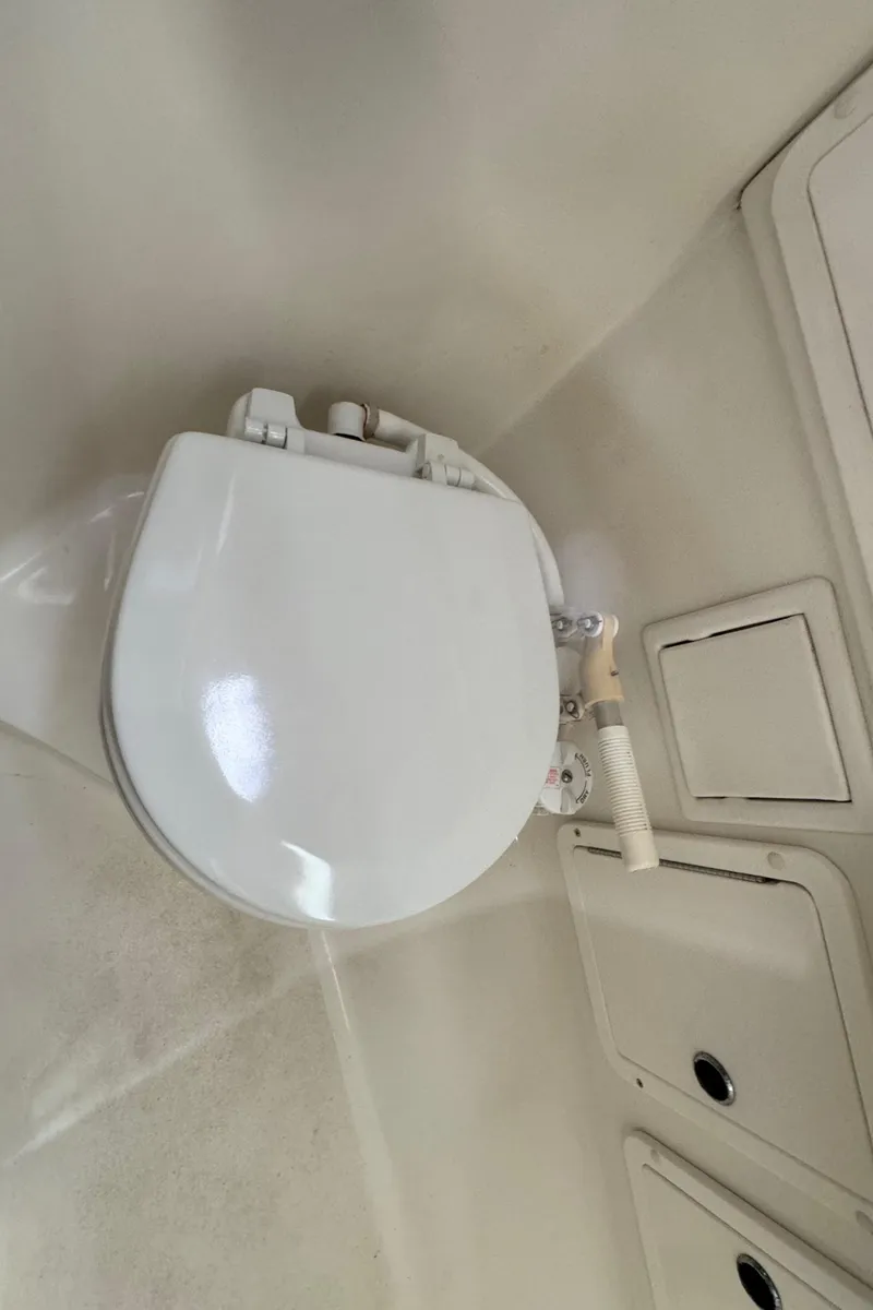 Slide: The Image of Aft Head Manual - 49