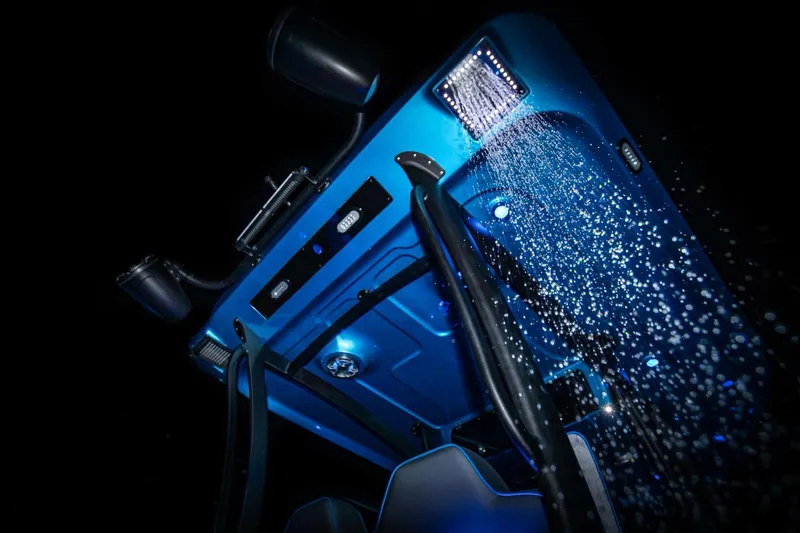 Slide: The Image of 2024 Glasstream GSX 36 boat interior with blue lighting and water spray effect. - 5