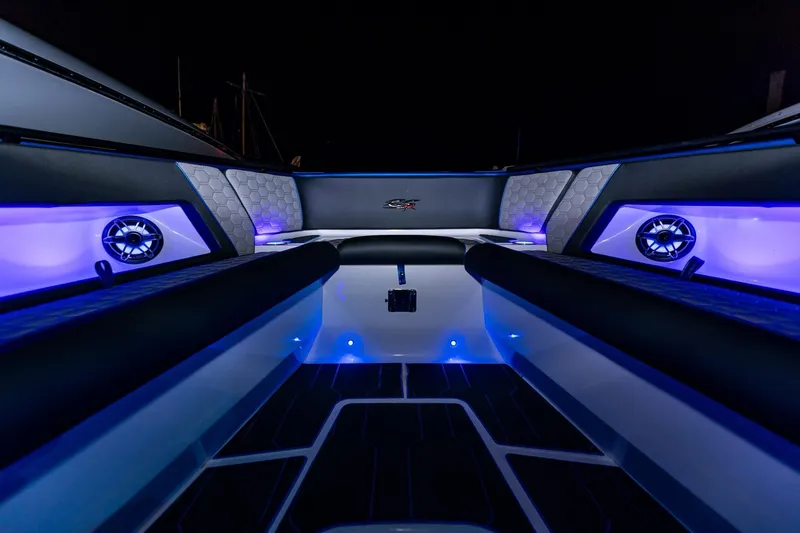 Slide: The Image of 2024 Glasstream GSX 36 boat interior with blue LED lighting and modern design. - 8