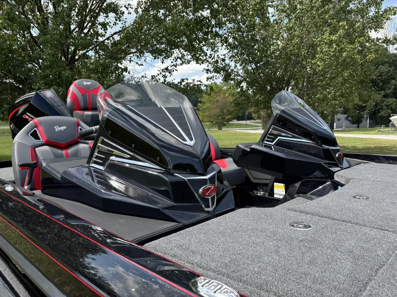 Slide: The Image of 2025 Ranger Z521R Ranger Cup Equipped boat with sleek design and dual consoles. - 12