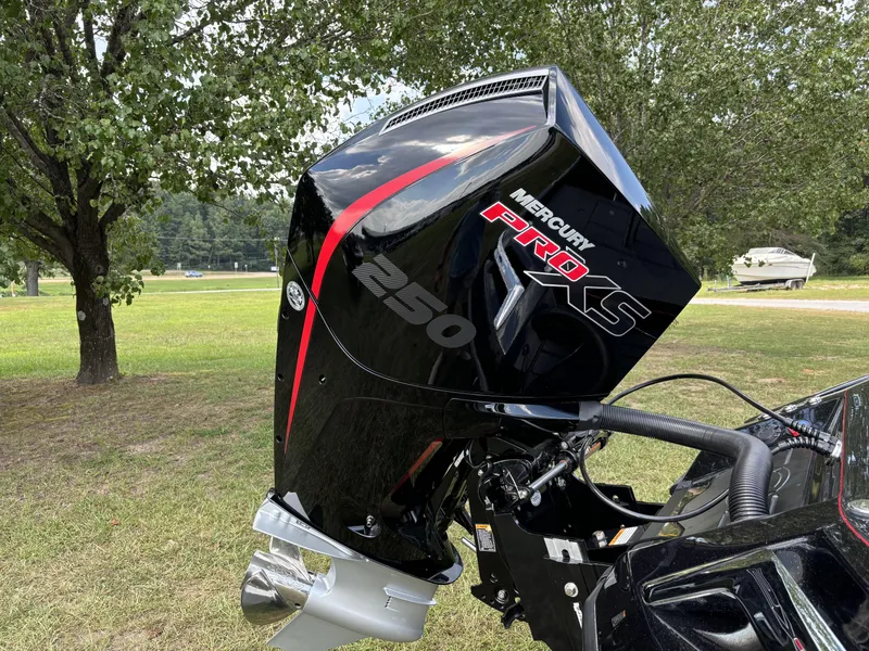 Slide: The Image of Mercury Pro XS 250 engine on 2025 Ranger Z521R boat, outdoors. - 5