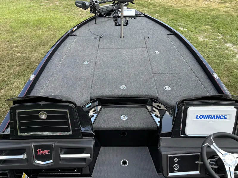 Slide: The Image of 2025 Ranger Z521R boat deck with Lowrance electronics, spacious layout, and modern design. - 7