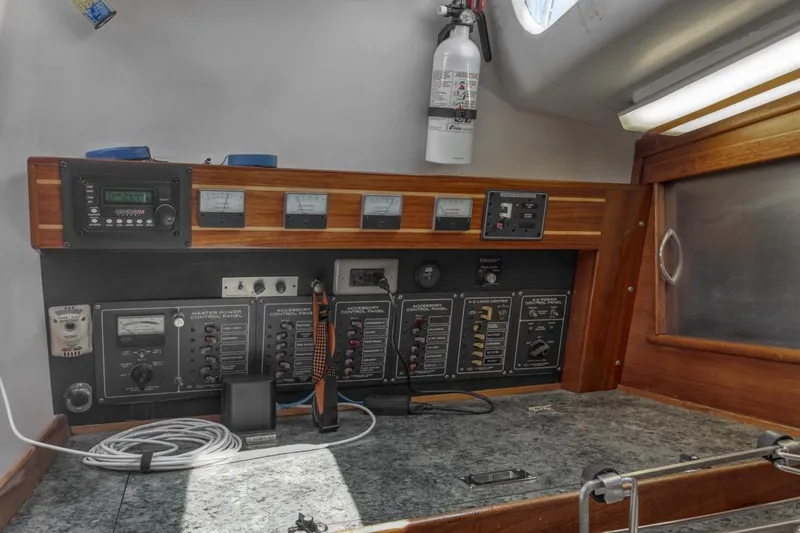 Slide: The Image of Electrical control panel on a 1972 Columbia 43 Custom sailboat. - 23