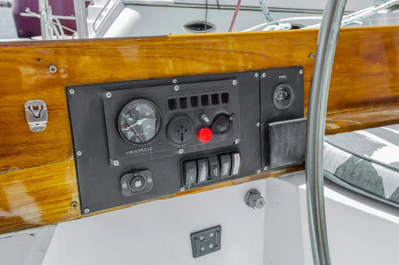 Slide: The Image of Control panel of a 1972 Columbia 43 Custom sailboat with gauges and switches. - 9