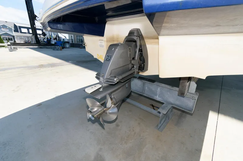 Slide: The Image of Rear view of 2013 Chaparral 224 Sunesta boat with visible propeller and outdrive. - 11