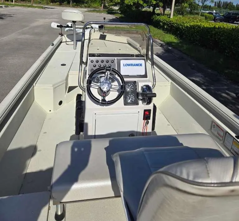 Slide: The Image of 2024 Ranger RB200 boat interior with steering console and Lowrance electronics. - 2