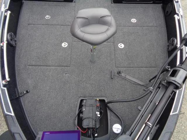 Slide: The Image of 2024 Nitro ZV21 Pro boat dashboard with steering wheel and electronic display. - 9