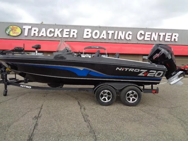 Slide: The Image of 2024 Nitro ZV20 boat on trailer outside Tracker Boating Center. - 0