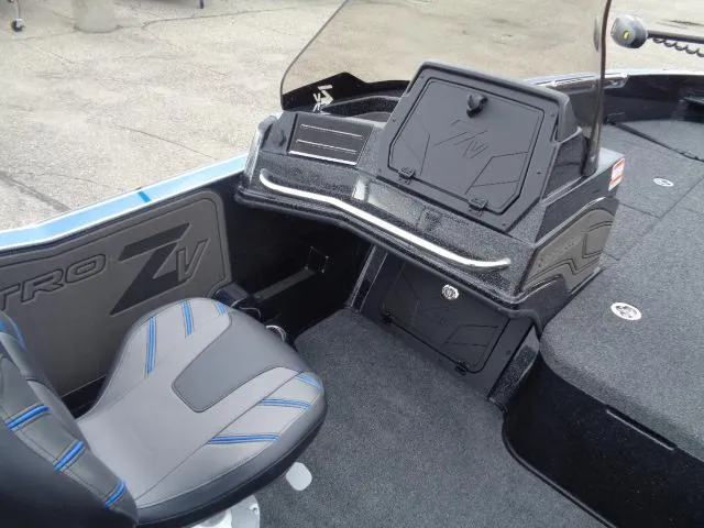 Slide: The Image of 2024 Nitro ZV20 boat interior with sleek dashboard and storage compartment. - 10