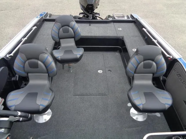 Slide: The Image of 2024 Nitro ZV20 boat interior with four black seats and a motor, on a snowy background. - 7