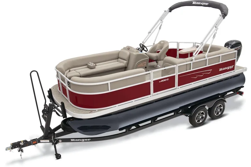Slide: The Image of 2024 Ranger Reata 200C boat with powerful outboard motor, parked on asphalt. - 2