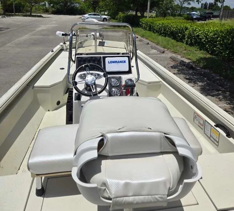 Slide: The Image of 2024 Ranger RB200 boat interior with Lowrance navigation system, parked outdoors. - 4