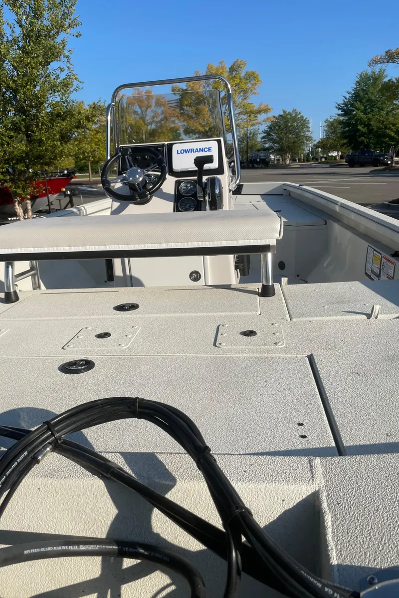 Slide: The Image of 2024 Ranger RB200 boat with Lowrance electronics, spacious deck, and steering console. - 2