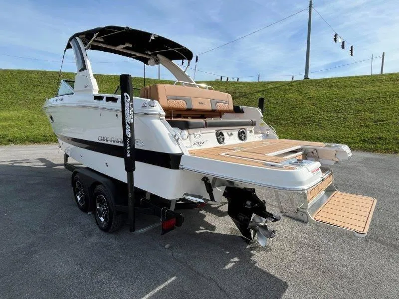 Slide: The Image of 2024 Chaparral 267 SSX boat on trailer, rear view, sunny day. - 18