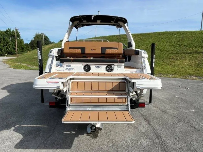 Slide: The Image of 2024 Chaparral 267 SSX boat rear view with extended swim platform. - 20