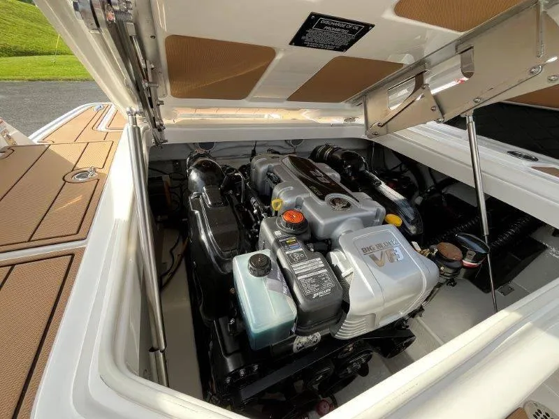 Slide: The Image of 2024 Chaparral 267 SSX engine compartment, showcasing powerful V8 engine details. - 24