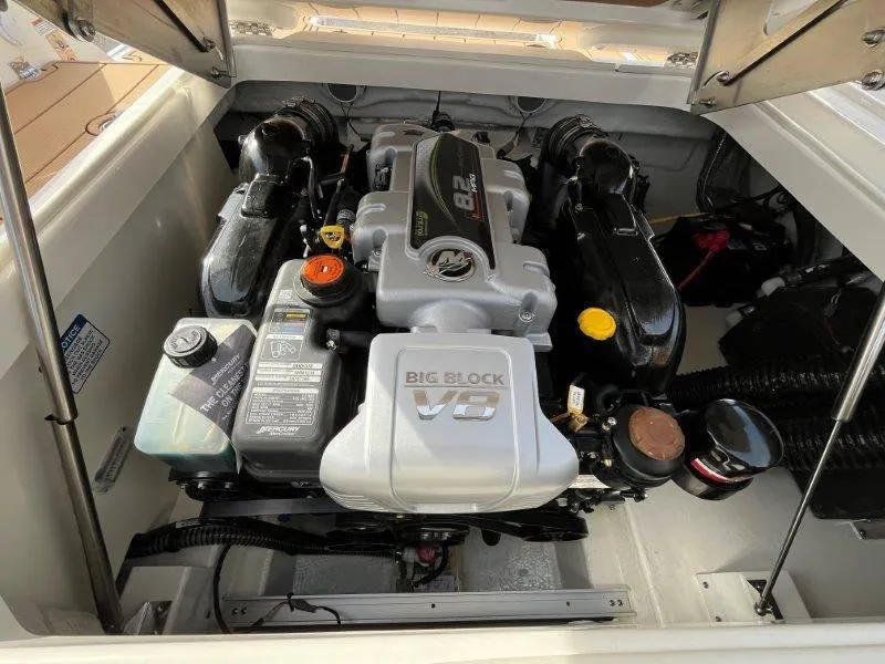 Slide: The Image of 2024 Chaparral 267 SSX engine compartment with Big Block V8 engine. - 46