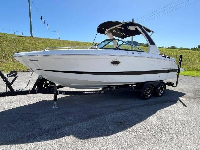 Slide: The Image of 2024 Chaparral 267 SSX boat on trailer, sunny day, side view. - 8