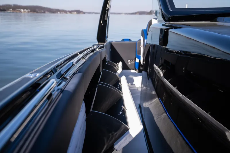 Slide: The Image of 2025 Cigarette 42 Auroris boat interior with sleek design on calm water. - 15