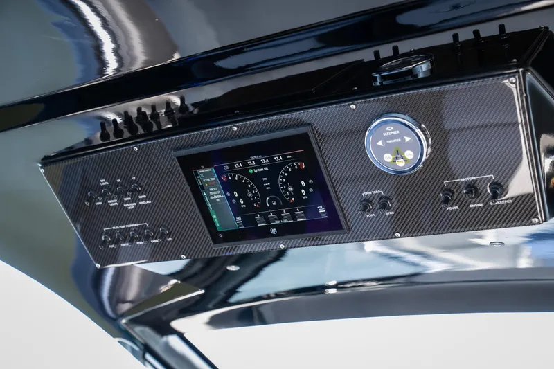 Slide: The Image of Dashboard of 2025 Cigarette 42 Auroris boat with digital display and controls. - 20