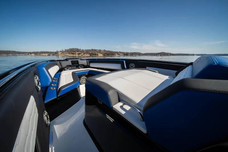 Slide: The Image of 2025 Cigarette 42 Auroris boat interior with blue and white seating on a sunny day. - 29