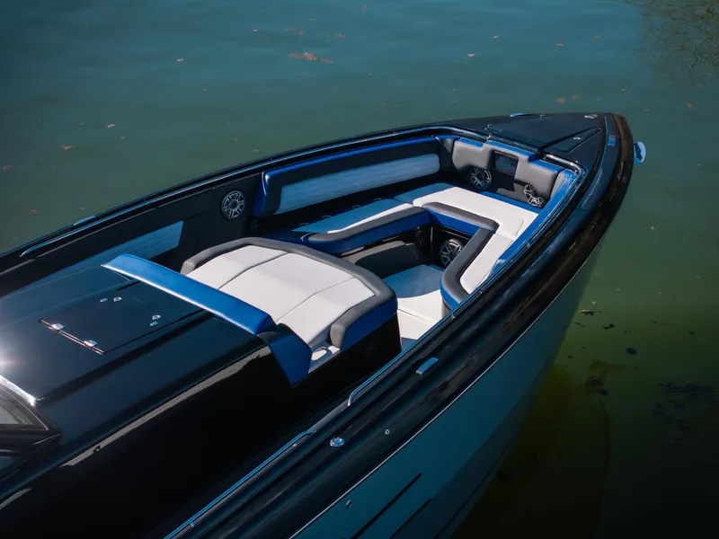 Slide: The Image of 2025 Cigarette 42 Auroris boat interior with sleek seating on calm water. - 7