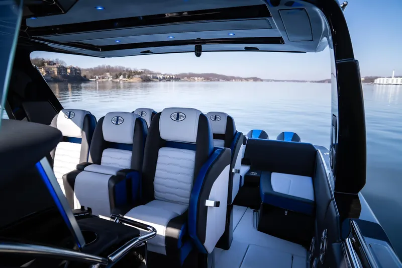 Slide: The Image of Luxurious interior of 2025 Cigarette 42 Auroris boat on calm water. - 9