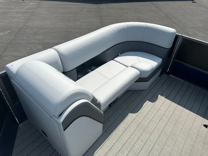 Slide: The Image of 2025 Bentley Pontoons Elite 223 Swingback Dual Capt. seating, luxurious white upholstery. - 12