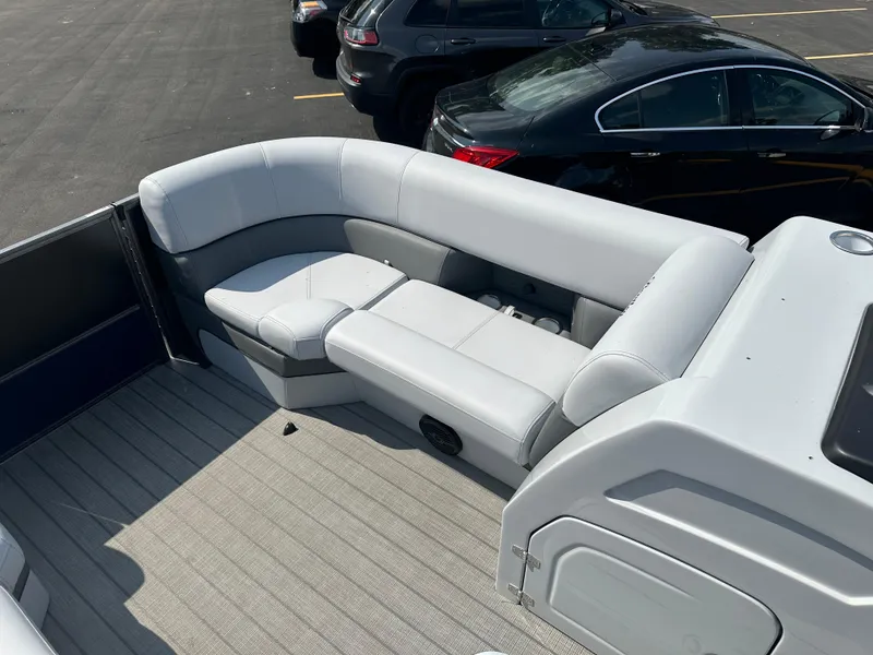 Slide: The Image of 2025 Bentley Pontoons Elite 223 Swingback Dual Capt. with luxurious seating and modern design. - 13