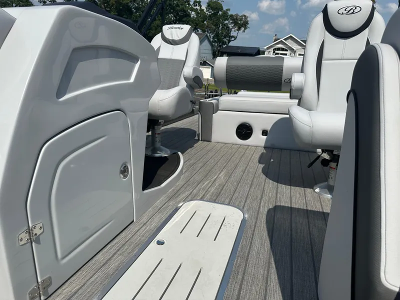 Slide: The Image of 2025 Bentley Pontoons Elite 223 interior with sleek seating and modern design. - 15