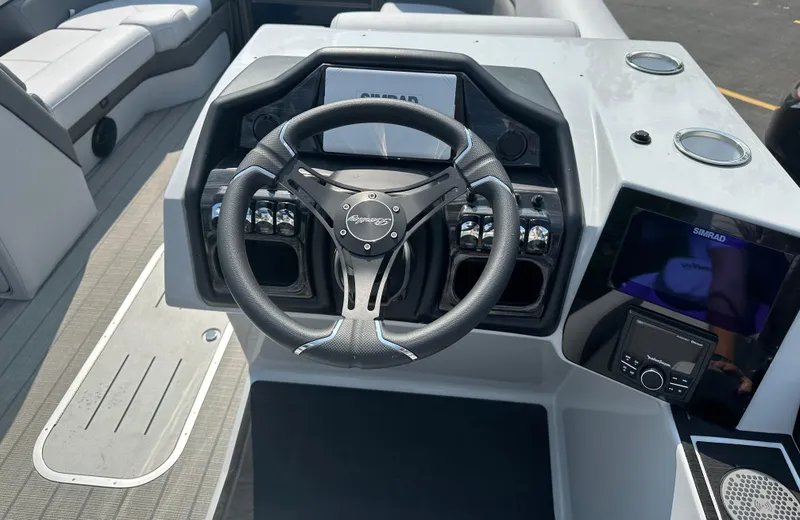 Slide: The Image of 2025 Bentley Pontoons Elite 223 Swingback Dual Capt. steering console with modern controls. - 7