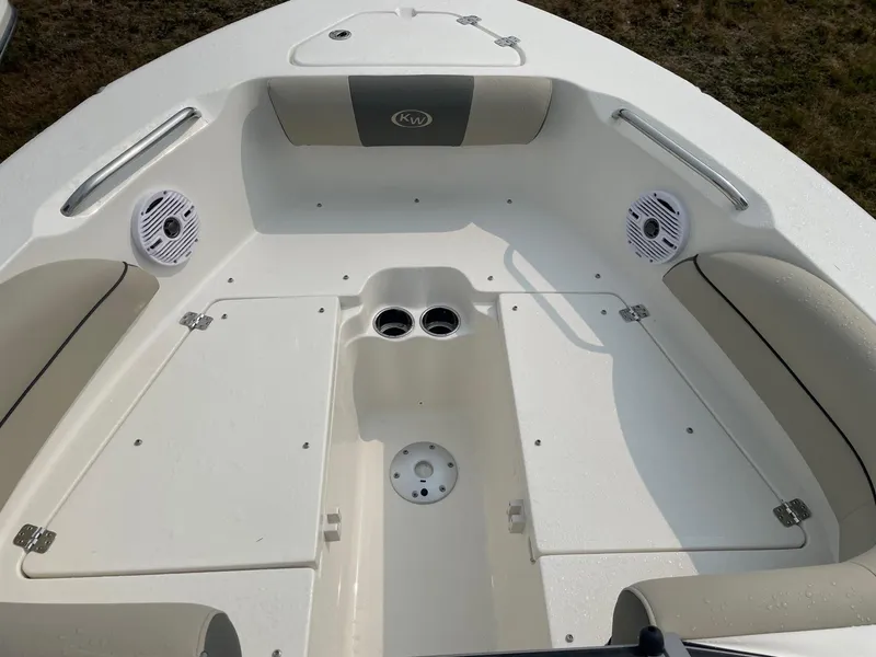 Slide: The Image of 2025 Key West 203 DFS boat interior with seating and speakers. - 5