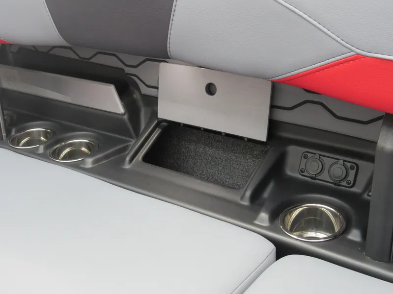 Slide: The Image of 2024 Malibu Wakesetter 23 LSV interior with cup holders and storage compartments. - 12