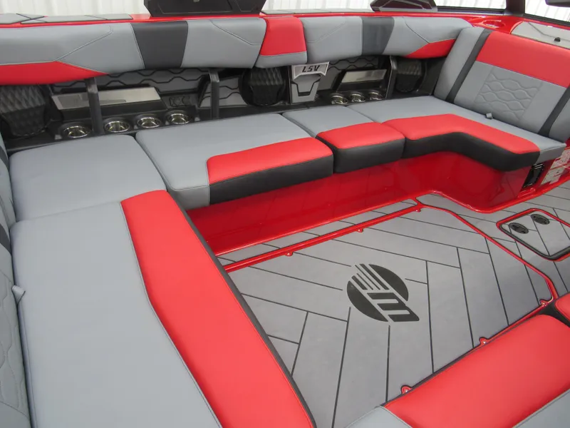 Slide: The Image of 2024 Malibu Wakesetter 23 LSV interior with red and gray seating. - 5