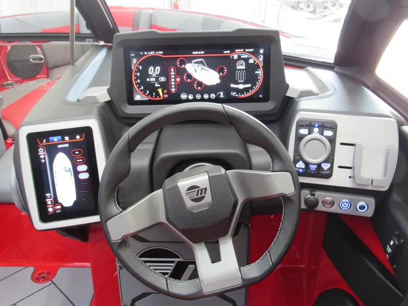 Slide: The Image of 2024 Malibu Wakesetter 23 LSV dashboard with advanced digital displays and controls. - 8
