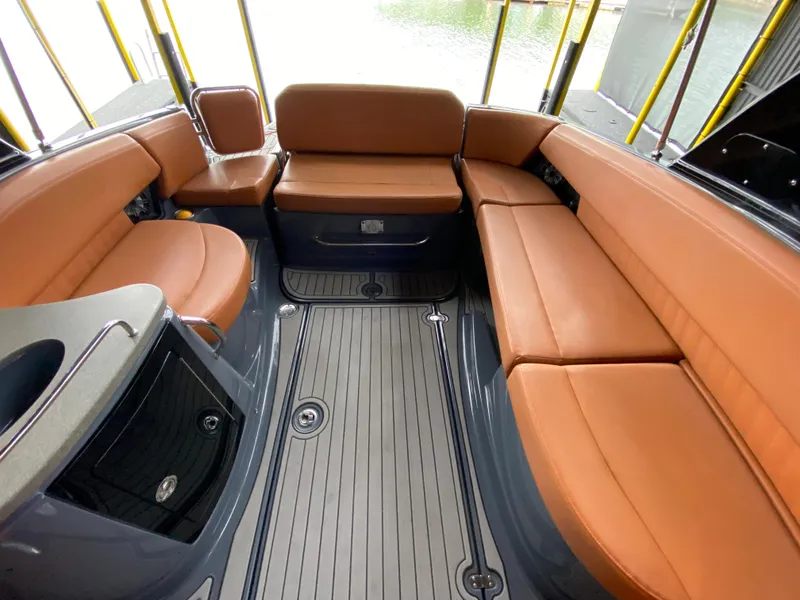Slide: The Image of 2017 Cruisers Sport Series 298 SS South Beach Edition interior with tan leather seating. - 14