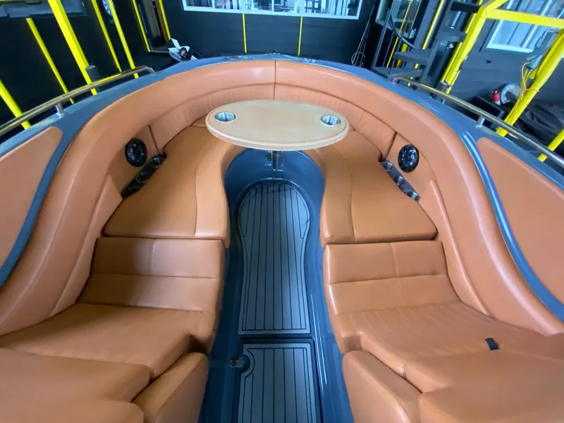 Slide: The Image of 2017 Cruisers Sport Series 298 SS South Beach Edition interior with tan leather seating. - 16