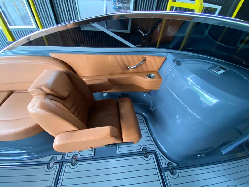 Slide: The Image of 2017 Cruisers Sport Series 298 SS South Beach Edition interior with tan leather seating. - 18