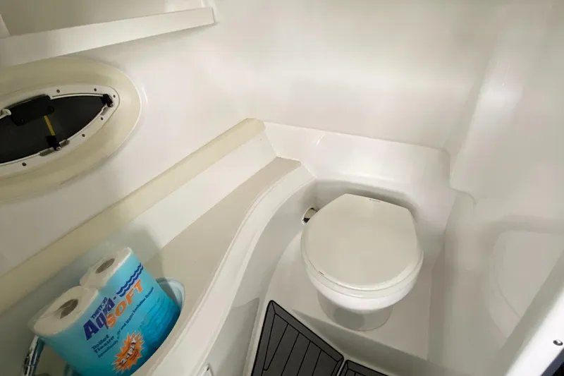 Slide: The Image of 2017 Cruisers Sport Series 298 SS South Beach Edition boat bathroom interior. - 28