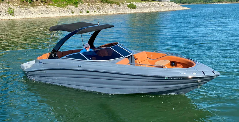 Slide: The Image of 2017 Cruisers Sport Series 298 SS South Beach Edition boat on a lake. - 3