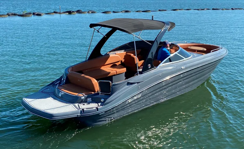 Slide: The Image of 2017 Cruisers Sport Series 298 SS South Beach Edition boat on water. - 5