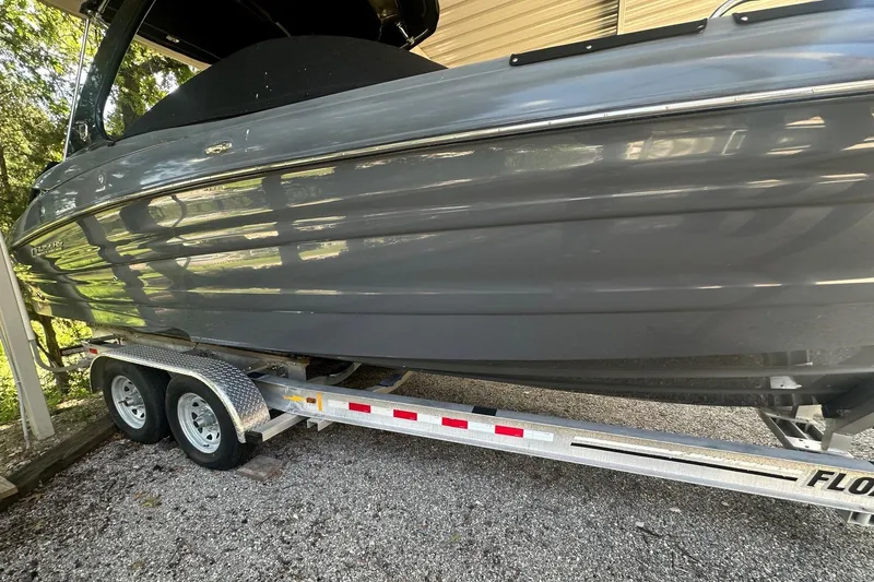 Slide: The Image of 2017 Cruisers Sport Series 298 SS South Beach Edition on trailer, side view. - 8